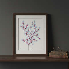 Blue and magenta blossom tree ink painting framed on a dark moody wooden shelf