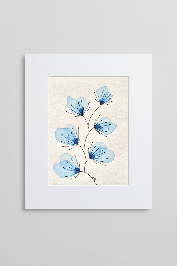 Blue leaves botanical artwork in white mat on neutral background