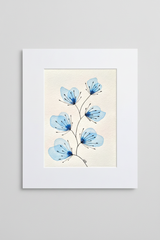 Blue leaves botanical artwork in white mat on neutral background