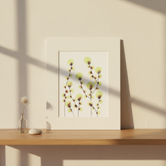Garden Melody #28 botanical painting displayed on a light oak console in soft daylight
