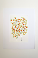 Green and orange tree botanical artwork in white mat on neutral background